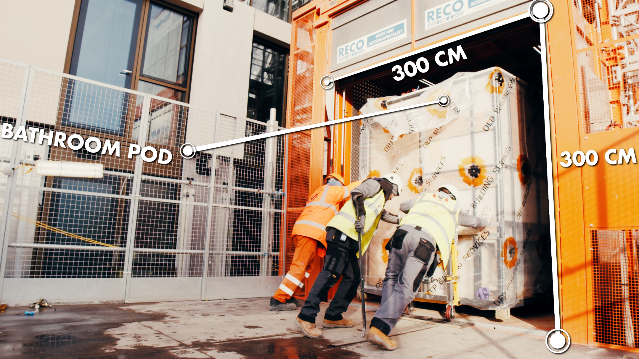 An entire prefab bathroom pod being loaded into a Stros Mammoth passenger goods hoist