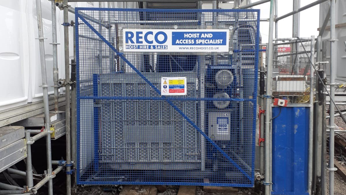 A GEDA 500Z Goods-only hoist ready to be loaded with construction materials