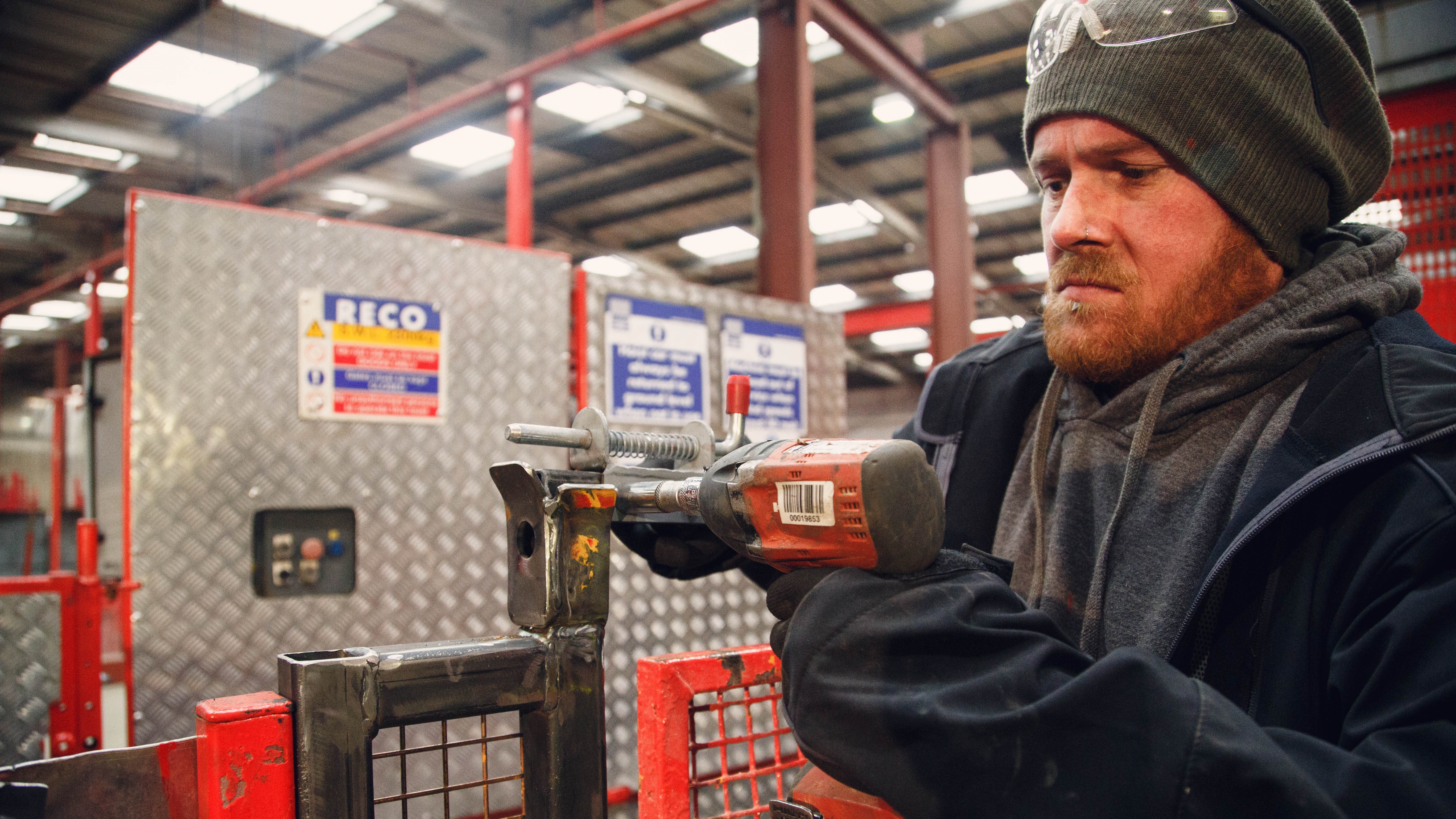 A RECO Hoist engineer working on a RECO GL150 constructon hoist