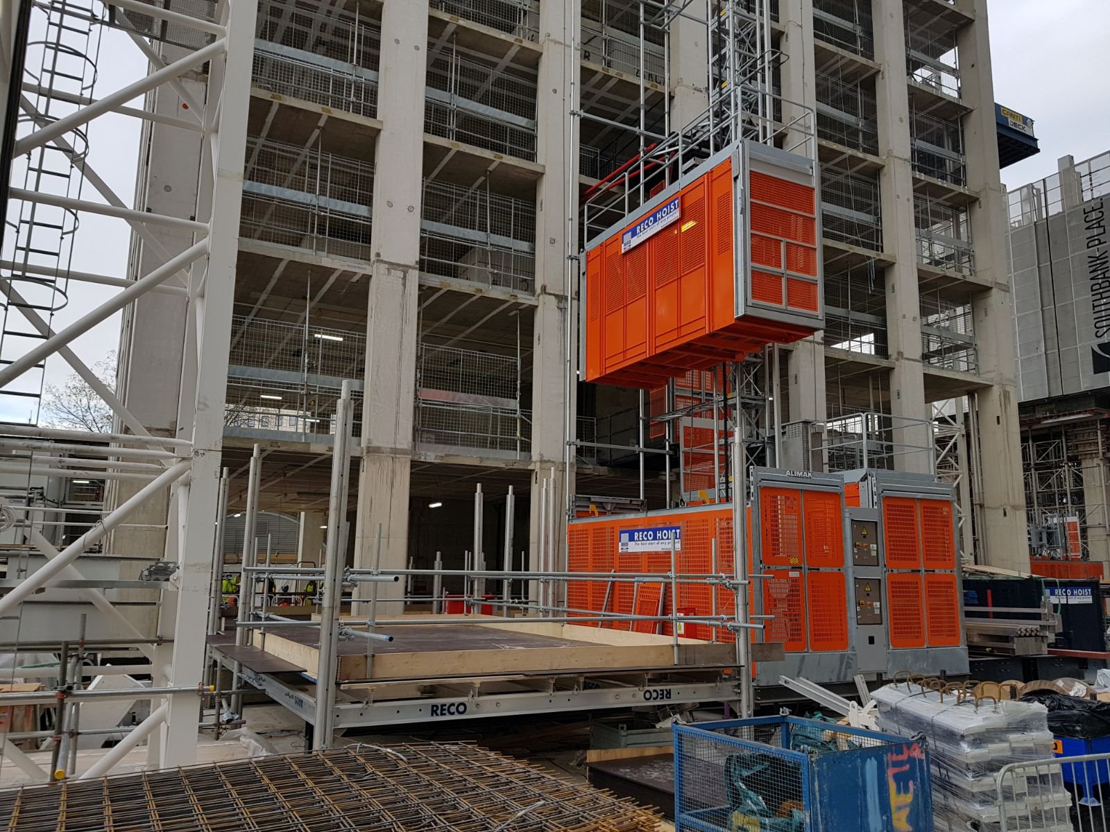RECO Loading Docks and Alimak passenger hoists at Canary Warf construction site in London