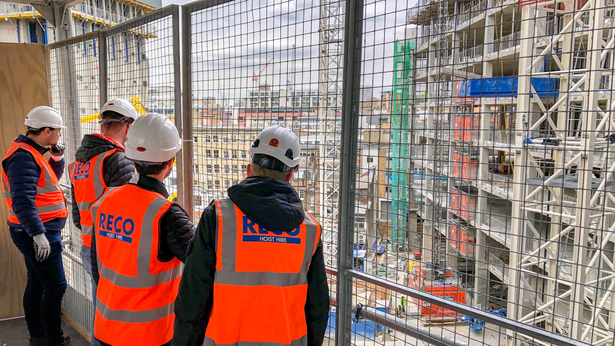 RECO Hoist Hire & Sales visiting a construction site with Alimak building hoists